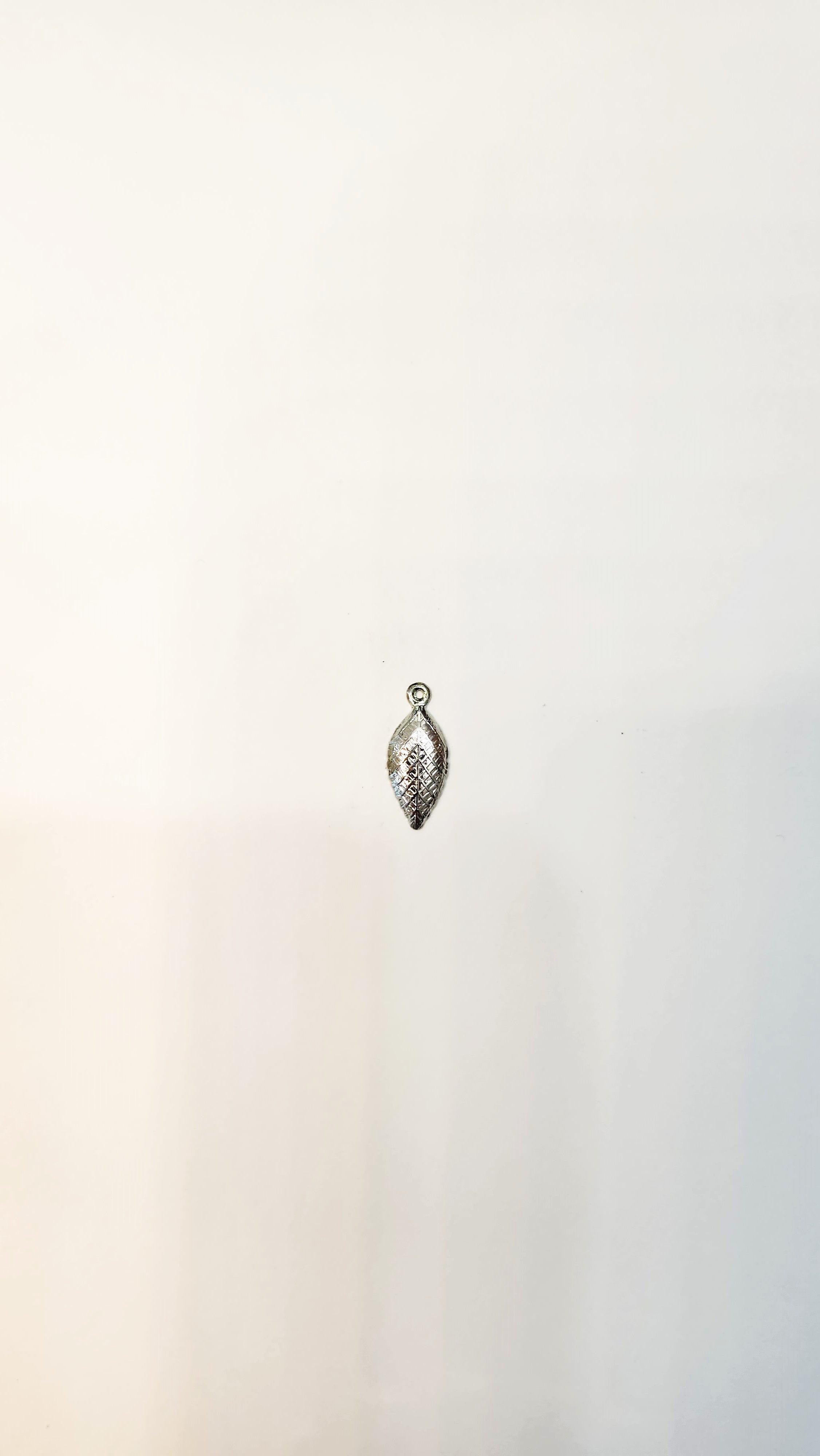 PENDENTE IN OTTONE COL. ARGENTO AMERICA