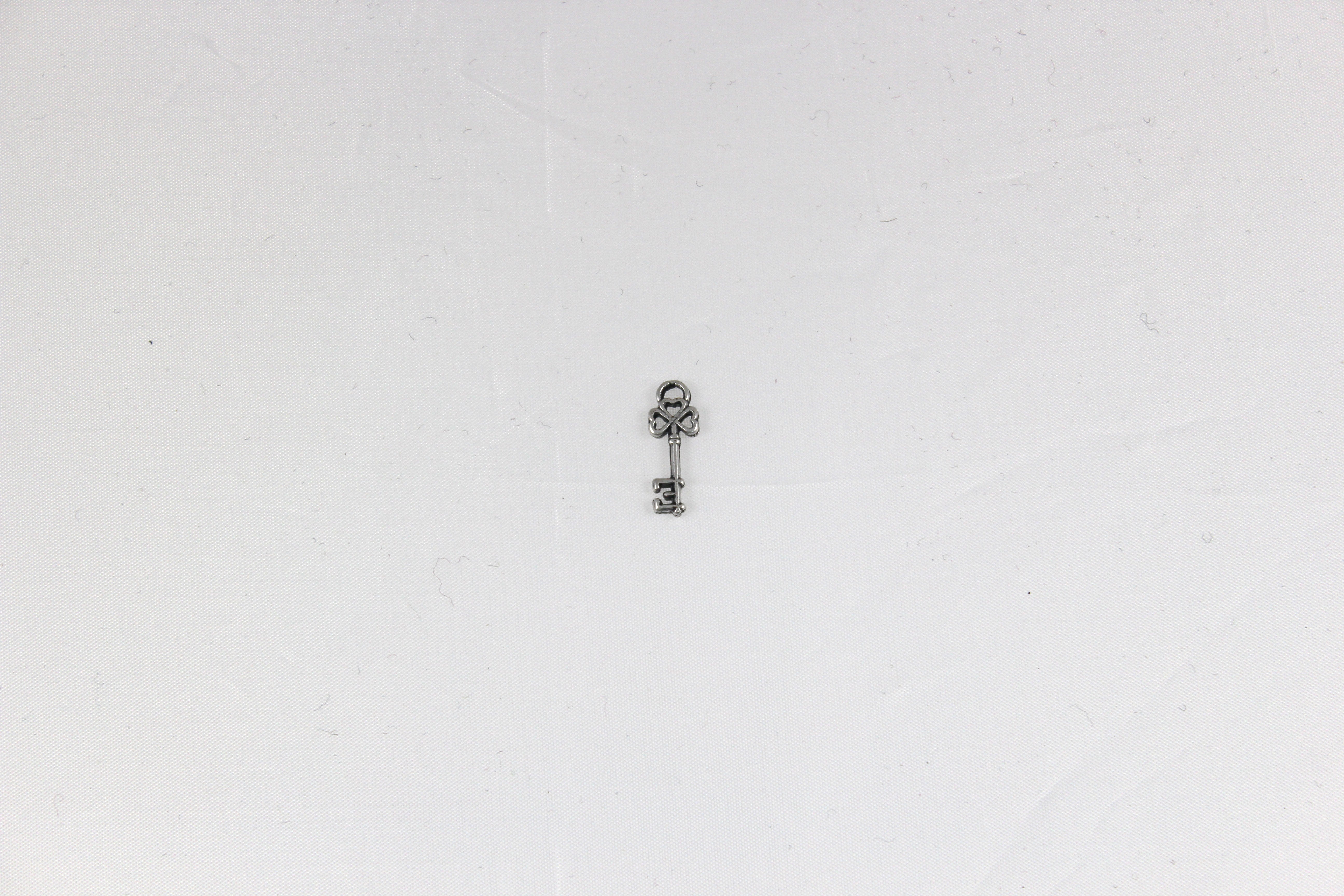 PENDENTE IN ZAMA COL ARGENTO ANTICO