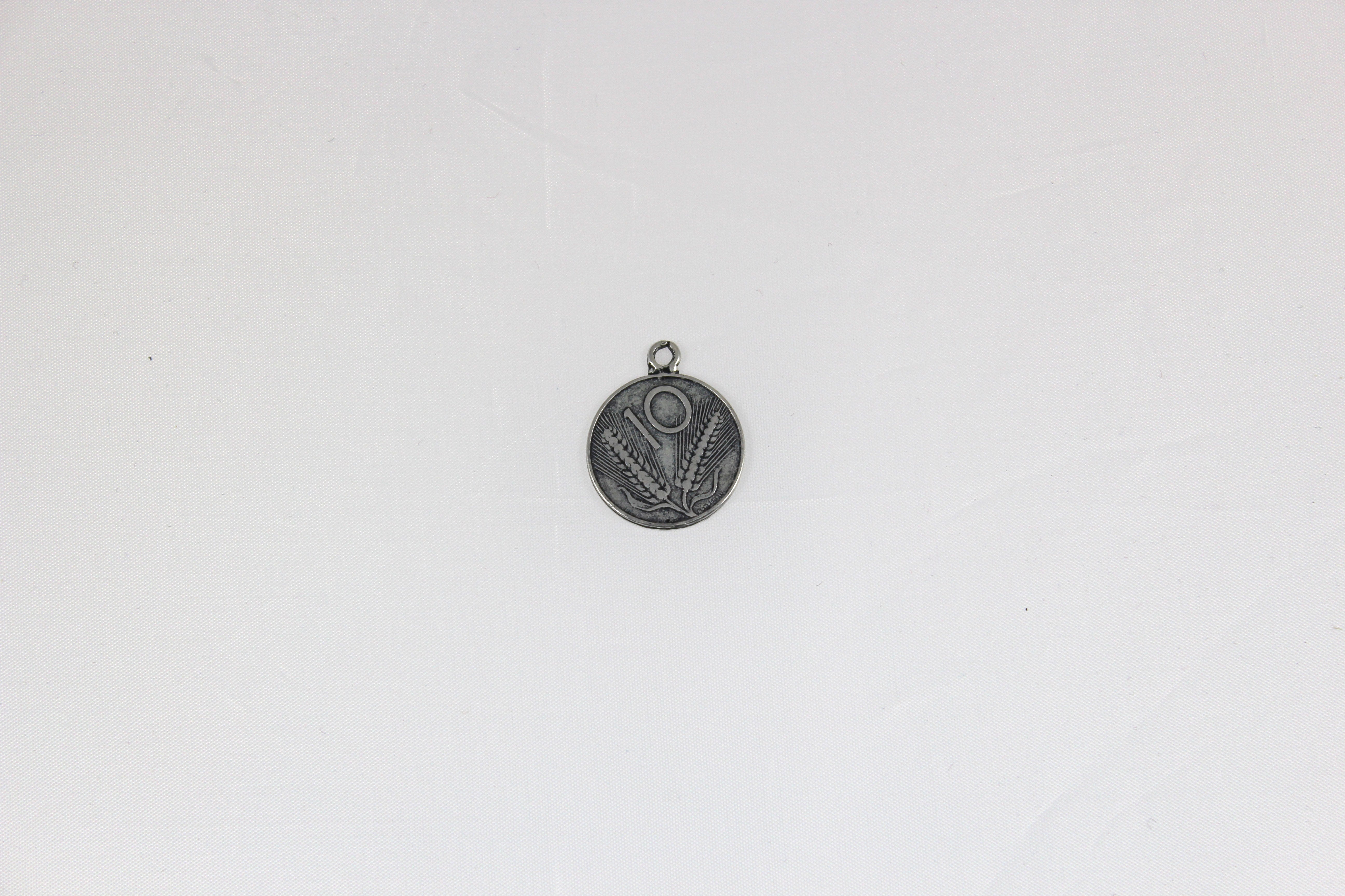 PENDENTE IN ZAMA COL BRONZO