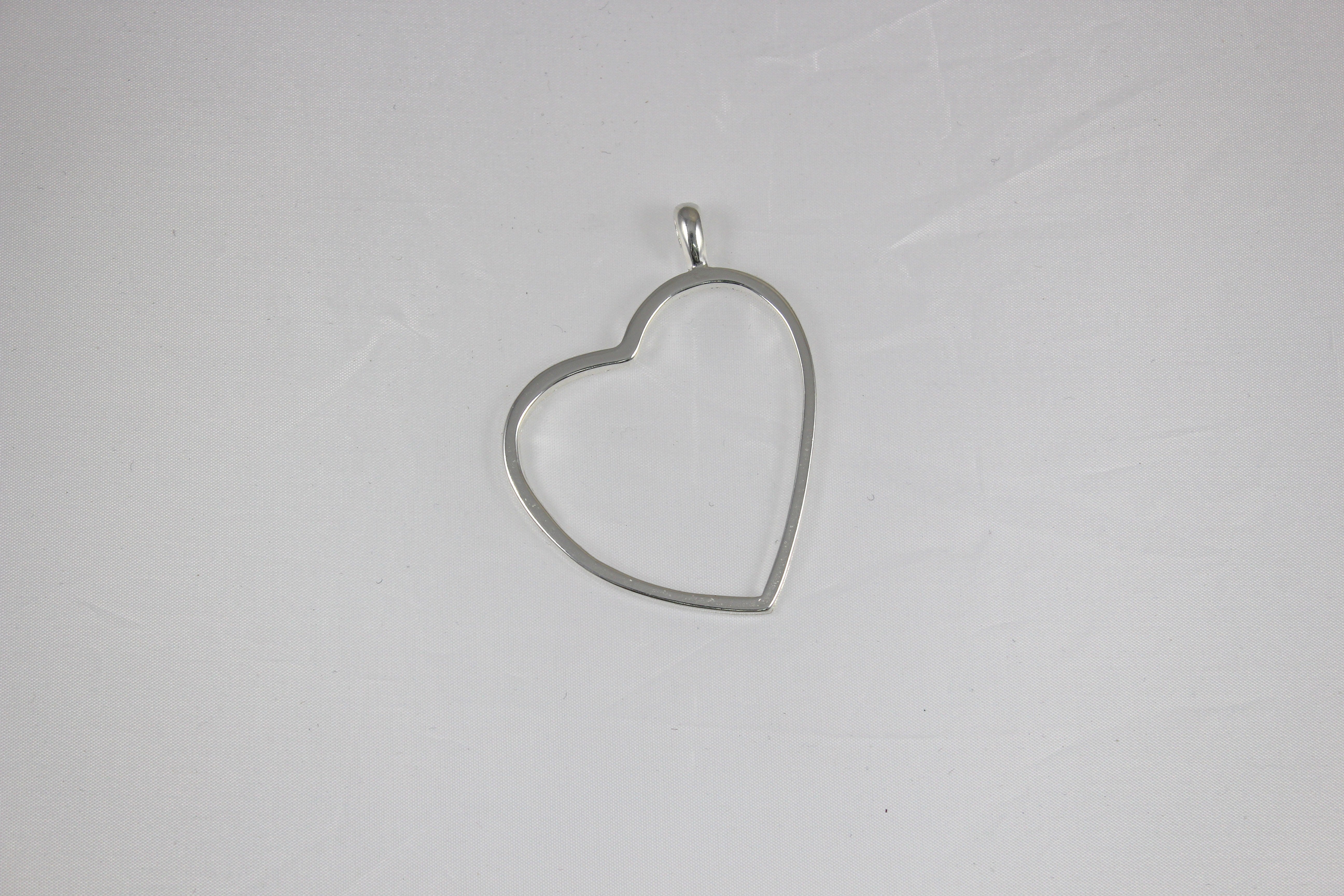 PENDENTE CUORE IN ZAMA COL.CANNA DI FUCILE