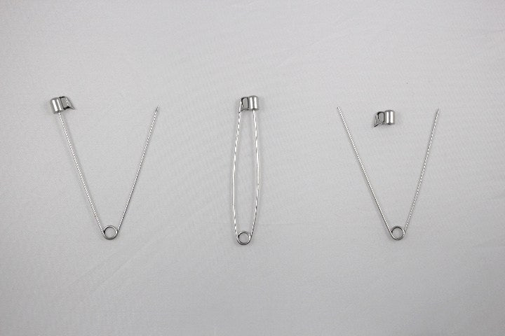 SPILLONE IN OTTONE COLORE ARGENTO